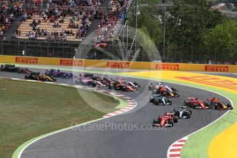 World © Octane Photographic Ltd. Formula 1 - Spanish Grand Prix Race. First lap drama, Vettel leads Hamilton ahead of Bottas and Raikkonen and Verstappen make contact and leave the track. Circuit de Barcelona - Catalunya, Spain. Sunday 14th May 2017. Digital Ref:1825LB1D3835