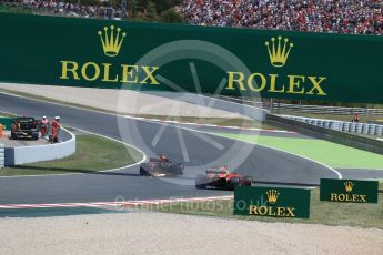 World © Octane Photographic Ltd. Formula 1 - Spanish Grand Prix Race. Max Verstappen - Red Bull Racing RB13 and Kimi Raikkonen with broken steering - Scuderia Ferrari SF70H limp back to the pits. Circuit de Barcelona - Catalunya, Spain. Sunday 14th May 2017. Digital Ref:1825LB1D4006