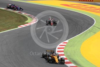 World © Octane Photographic Ltd. Formula 1 - Spanish Grand Prix Race. Nico Hulkenberg - Renault Sport F1 Team R.S.17, Kevin Magnussen - Haas F1 Team VF-17 and Carlos Sainz - Scuderia Toro Rosso STR12. Circuit de Barcelona - Catalunya, Spain. Sunday 14th May 2017. Digital Ref:1825LB1D4074