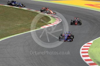 World © Octane Photographic Ltd. Formula 1 - Spanish Grand Prix Race. Carlos Sainz - Scuderia Toro Rosso STR12, Romain Grosjean - Haas F1 Team VF-17, Fernando Alonso - McLaren Honda MCL32 and Pascal Wehrlein – Sauber F1 Team C36. Circuit de Barcelona - Catalunya, Spain. Sunday 14th May 2017. Digital Ref:1825LB1D4083