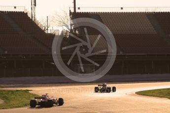 World © Octane Photographic Ltd. Formula 1 - Winter Test 1. Nico Hulkenberg - Renault Sport F1 Team R.S.17 and Sebastian Vettel - Scuderia Ferrari SF70H. Circuit de Barcelona-Catalunya. Monday 27th February 2017. Digital Ref : 1780CB1D3510