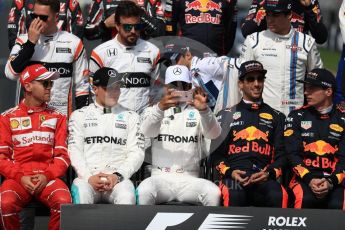 World © Octane Photographic Ltd. Formula 1 - Australian Grand Prix – Class of 2017. Driver Group Photo. Kimi Raikkonen, Ferrari, Sebastian Vettel, Ferrari, Valtteri Bottas, Mercedes AMG, Lewis Hamilton, Mercedes AMG, Daniel Ricciardo, Red Bull Racing, Max Verstappen, Red Bull, Sergio Perez, Force India, and Esteban Ocon, Force India. Stoffel Vandoorne, McLaren, Fernando Alonso, McLaren, Felipe Massa, Williams Martini Racing, Lance Stroll, Williams Martini Racing, Nico Hulkenberg, Renault and Jolyon Palmer, Renault Sport F1. Kevin Magnussen, Haas F1, Romain Grosjean, Haas F1, Daniil Kvyat, Toro Rosso, Carlos Sainz Jr, Toro Rosso, Marcus Ericsson, Sauber and Pascal Wehrlein, Sauber. Albert Park Circuit. Sunday 26th March 2017. Digital Ref: 1800LB1D5205