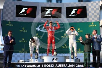 World © Octane Photographic Ltd. Formula 1 - Australian Grand Prix - Podium. Sebastian Vettel - Scuderia Ferrari SF70H, Lewis Hamilton and Valtteri Bottas - Mercedes AMG Petronas F1 W08 EQ Energy+. Albert Park Circuit. Sunday 26th March 2017. Digital Ref: 1803LB1D7332