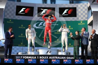 World © Octane Photographic Ltd. Formula 1 - Australian Grand Prix - Podium. Sebastian Vettel - Scuderia Ferrari SF70H, Lewis Hamilton and Valtteri Bottas - Mercedes AMG Petronas F1 W08 EQ Energy+. Albert Park Circuit. Sunday 26th March 2017. Digital Ref: 1803LB1D7338