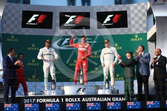 World © Octane Photographic Ltd. Formula 1 - Australian Grand Prix - Podium. Sebastian Vettel - Scuderia Ferrari SF70H, Lewis Hamilton and Valtteri Bottas - Mercedes AMG Petronas F1 W08 EQ Energy+. Albert Park Circuit. Sunday 26th March 2017. Digital Ref: 1803LB1D7344