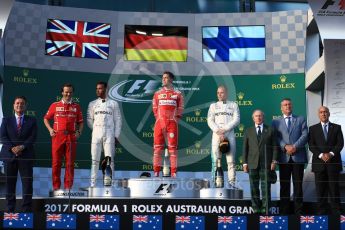 World © Octane Photographic Ltd. Formula 1 - Australian Grand Prix - Podium. Sebastian Vettel - Scuderia Ferrari SF70H, Lewis Hamilton and Valtteri Bottas - Mercedes AMG Petronas F1 W08 EQ Energy+. Albert Park Circuit. Sunday 26th March 2017. Digital Ref: 1803LB1D7412