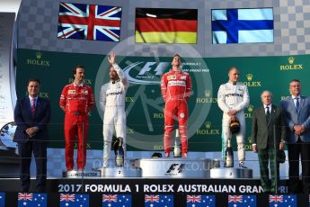 World © Octane Photographic Ltd. Formula 1 - Australian Grand Prix - Podium. Sebastian Vettel - Scuderia Ferrari SF70H, Lewis Hamilton and Valtteri Bottas - Mercedes AMG Petronas F1 W08 EQ Energy+. Albert Park Circuit. Sunday 26th March 2017. Digital Ref: 1803LB1D7421