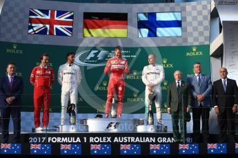 World © Octane Photographic Ltd. Formula 1 - Australian Grand Prix - Podium. Sebastian Vettel - Scuderia Ferrari SF70H, Lewis Hamilton and Valtteri Bottas - Mercedes AMG Petronas F1 W08 EQ Energy+. Albert Park Circuit. Sunday 26th March 2017. Digital Ref: 1803LB1D7442