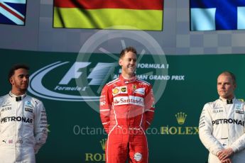 World © Octane Photographic Ltd. Formula 1 - Australian Grand Prix - Podium. Sebastian Vettel - Scuderia Ferrari SF70H, Lewis Hamilton and Valtteri Bottas - Mercedes AMG Petronas F1 W08 EQ Energy+. Albert Park Circuit. Sunday 26th March 2017. Digital Ref: 1803LB1D7486