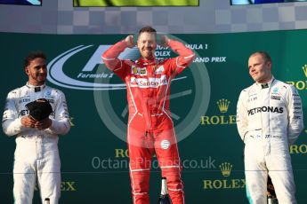 World © Octane Photographic Ltd. Formula 1 - Australian Grand Prix - Podium. Sebastian Vettel - Scuderia Ferrari SF70H, Lewis Hamilton and Valtteri Bottas - Mercedes AMG Petronas F1 W08 EQ Energy+. Albert Park Circuit. Sunday 26th March 2017. Digital Ref: 1803LB1D7520