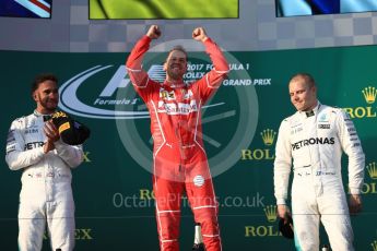 World © Octane Photographic Ltd. Formula 1 - Australian Grand Prix - Podium. Sebastian Vettel - Scuderia Ferrari SF70H, Lewis Hamilton and Valtteri Bottas - Mercedes AMG Petronas F1 W08 EQ Energy+. Albert Park Circuit. Sunday 26th March 2017. Digital Ref: 1803LB1D7523