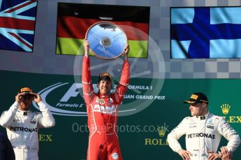 World © Octane Photographic Ltd. Formula 1 - Australian Grand Prix - Podium. Sebastian Vettel - Scuderia Ferrari SF70H, Lewis Hamilton and Valtteri Bottas - Mercedes AMG Petronas F1 W08 EQ Energy+. Albert Park Circuit. Sunday 26th March 2017. Digital Ref: 1803LB1D7538