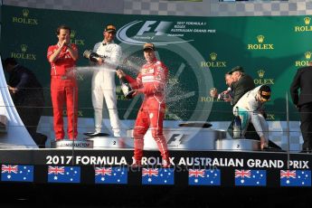 World © Octane Photographic Ltd. Formula 1 - Australian Grand Prix - Podium. Sebastian Vettel - Scuderia Ferrari SF70H, Lewis Hamilton and Valtteri Bottas - Mercedes AMG Petronas F1 W08 EQ Energy+. Albert Park Circuit. Sunday 26th March 2017. Digital Ref: 1803LB1D7631