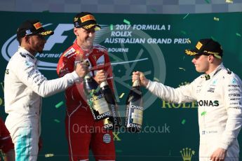 World © Octane Photographic Ltd. Formula 1 - Australian Grand Prix - Podium. Sebastian Vettel - Scuderia Ferrari SF70H, Lewis Hamilton and Valtteri Bottas - Mercedes AMG Petronas F1 W08 EQ Energy+. Albert Park Circuit. Sunday 26th March 2017. Digital Ref: 1803LB1D7826