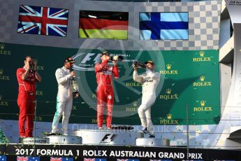 World © Octane Photographic Ltd. Formula 1 - Australian Grand Prix - Podium. Sebastian Vettel - Scuderia Ferrari SF70H, Lewis Hamilton and Valtteri Bottas - Mercedes AMG Petronas F1 W08 EQ Energy+. Albert Park Circuit. Sunday 26th March 2017. Digital Ref: 1803LB1D7839