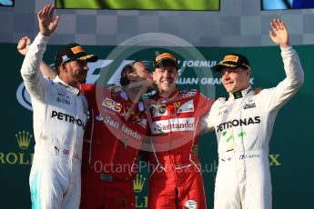 World © Octane Photographic Ltd. Formula 1 - Australian Grand Prix - Podium. Sebastian Vettel - Scuderia Ferrari SF70H, Lewis Hamilton and Valtteri Bottas - Mercedes AMG Petronas F1 W08 EQ Energy+. Albert Park Circuit. Sunday 26th March 2017. Digital Ref: 1803LB1D7873