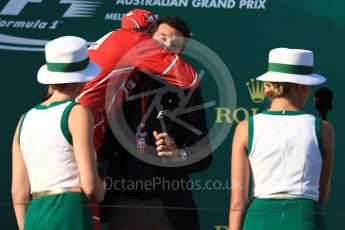 World © Octane Photographic Ltd. Formula 1 - Australian Grand Prix - Podium. Sebastian Vettel - Scuderia Ferrari SF70H hugs Mark Webber. Albert Park Circuit. Sunday 26th March 2017. Digital Ref: 1803LB1D7917
