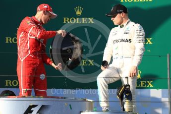 World © Octane Photographic Ltd. Formula 1 - Australian Grand Prix - Podium. Sebastian Vettel - Scuderia Ferrari SF70H and Valtteri Bottas - Mercedes AMG Petronas F1 W08 EQ Energy+. Albert Park Circuit. Sunday 26th March 2017. Digital Ref: 1803LB1D7991