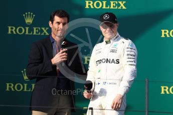 World © Octane Photographic Ltd. Formula 1 - Australian Grand Prix - Podium. Valtteri Bottas - Mercedes AMG Petronas F1 W08 EQ Energy+ and Mark Webber. Albert Park Circuit. Sunday 26th March 2017. Digital Ref: 1803LB1D8033 1803LB1D8033