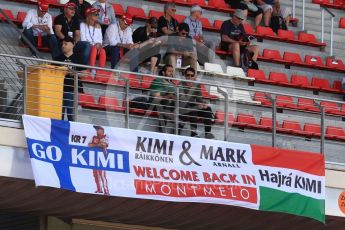 World © Octane Photographic Ltd. Formula 1 - Spanish Grand Prix Qualifying. Kimi Raikkonen and Mark Arnall fans in the grandstand- . Circuit de Barcelona - Catalunya, Spain. Saturday 13th May 2017. Digital Ref:1816LB1D1308