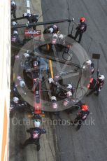 World © Octane Photographic Ltd. Formula 1 - Winter Test 2. Romain Grosjean - Haas F1 Team VF-17 and team doing a pit stop. Circuit de Barcelona-Catalunya. Friday 10th March 2017. Digital Ref: 1787LB5D0143