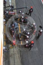 World © Octane Photographic Ltd. Formula 1 - Winter Test 2. Romain Grosjean - Haas F1 Team VF-17 and team doing a pit stop. Circuit de Barcelona-Catalunya. Friday 10th March 2017. Digital Ref: 1787LB5D0153
