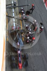 World © Octane Photographic Ltd. Formula 1 - Winter Test 2. Romain Grosjean - Haas F1 Team VF-17 and team doing a pit stop. Circuit de Barcelona-Catalunya. Friday 10th March 2017. Digital Ref: 1787LB5D0159