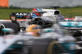 World © Octane Photographic Ltd. Formula 1 - Winter Test 1. Lance Stroll - Williams Martini Racing FW40 and Lewis Hamilton - Mercedes AMG Petronas F1 W08 EQ Energy+. Circuit de Barcelona-Catalunya. Tuesday 28th February2017. Digital Ref :1781CB1D7346