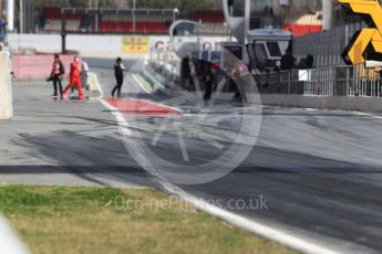 World © Octane Photographic Ltd. Formula 1 - Winter Test 1. 2017 Cars lay down rubber on pit exit. Circuit de Barcelona-Catalunya. Tuesday 28th February 2017. Digital Ref :