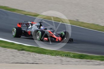 World © Octane Photographic Ltd. Formula 1 - Winter Test 1. Romain Grosjean - Haas F1 Team VF-17. Circuit de Barcelona-Catalunya. Thursday 2nd March 2017. Digital Ref :1783CB1D9586