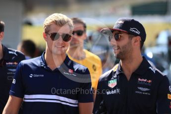 World © Octane Photographic Ltd. Formula 1 - Japanese Grand Prix - Sunday - Drivers’ Parade. Daniel Ricciardo - Red Bull Racing RB13 and Marcus Ericsson – Sauber F1 Team C36. Suzuka Circuit, Suzuka, Japan. Sunday 8th October 2017. Digital Ref:1979LB1D0044