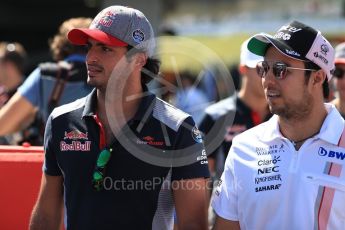 World © Octane Photographic Ltd. Formula 1 - Japanese Grand Prix - Sunday - Drivers’ Parade. Sergio Perez - Sahara Force India VJM10 and Carlos Sainz - Scuderia Toro Rosso STR12. Suzuka Circuit, Suzuka, Japan. Sunday 8th October 2017. Digital Ref:1979LB1D0076