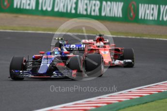 World © Octane Photographic Ltd. Formula 1 - Japanese Grand Prix - Friday - Practice 1. Carlos Sainz - Scuderia Toro Rosso STR12 and Sebastian Vettel - Scuderia Ferrari SF70H. Suzuka Circuit, Suzuka, Japan. Friday 6th October 2017. Digital Ref:1972LB1D7417