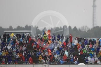World © Octane Photographic Ltd. Formula 1 - Japanese Grand Prix - Friday - Practice 2. Grandstand crowds wrapped up in the rain. Suzuka Circuit, Suzuka, Japan. Friday 6th October 2017. Digital Ref:1973LB1D8533