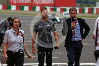 World © Octane Photographic Ltd. Formula 1 - Japanese Grand Prix - Saturday - Qualifying. Jenson Button and Davis Coulthard waiting to interview Lewis Hamilton - Mercedes AMG Petronas F1 W08 EQ Energy+. Suzuka Circuit, Suzuka, Japan. Saturday 7th October 2017. Digital Ref:1977LB2D4996