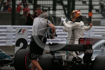 World © Octane Photographic Ltd. Formula 1 - Japanese Grand Prix - Saturday - Qualifying. Lewis Hamilton and Valtteri Bottas - Mercedes AMG Petronas F1 W08 EQ Energy+ on track to be interviewed. Suzuka Circuit, Suzuka, Japan. Saturday 7th October 2017. Digital Ref:1977LB2D5058