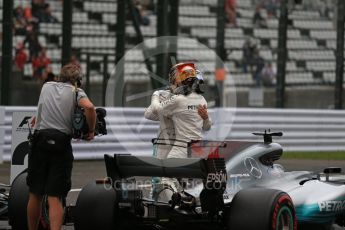 World © Octane Photographic Ltd. Formula 1 - Japanese Grand Prix - Saturday - Qualifying. Lewis Hamilton and Valtteri Bottas - Mercedes AMG Petronas F1 W08 EQ Energy+ on track to be interviewed. Suzuka Circuit, Suzuka, Japan. Saturday 7th October 2017. Digital Ref:1977LB2D5062