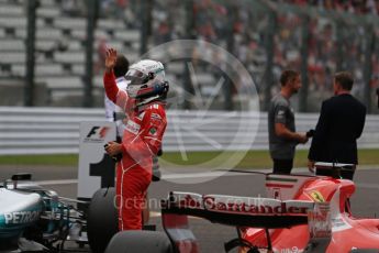 World © Octane Photographic Ltd. Formula 1 - Japanese Grand Prix - Saturday - Qualifying. Sebastian Vettel - Scuderia Ferrari SF70H on track to be interviewed. Suzuka Circuit, Suzuka, Japan. Saturday 7th October 2017. Digital Ref:1977LB2D5088