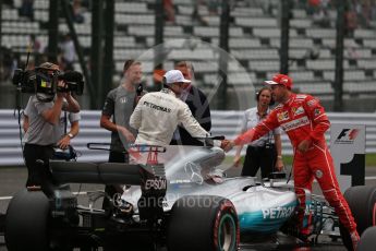 World © Octane Photographic Ltd. Formula 1 - Japanese Grand Prix - Saturday - Qualifying. Lewis Hamilton - Mercedes AMG Petronas F1 W08 EQ Energy+ and Sebastian Vettel - Scuderia Ferrari SF70H on track to be interviewed. Suzuka Circuit, Suzuka, Japan. Saturday 7th October 2017. Digital Ref:1977LB2D5144