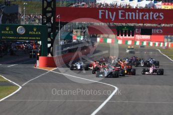 World © Octane Photographic Ltd. Formula 1 - Japanese Grand Prix - Sunday - Race. Lights out - race start, Lewis Hamilton leads in his Mercedes AMG Petronas F1 W08 EQ Energy+. Suzuka Circuit, Suzuka, Japan. Sunday 8th October 2017. Digital Ref:1980LB1D0431