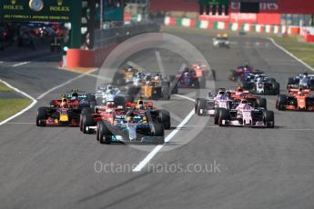 World © Octane Photographic Ltd. Formula 1 - Japanese Grand Prix - Sunday - Race. Lights out - race start, Lewis Hamilton leads in his Mercedes AMG Petronas F1 W08 EQ Energy+. Suzuka Circuit, Suzuka, Japan. Sunday 8th October 2017. Digital Ref:1980LB1D0448