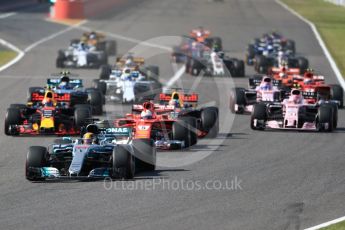 World © Octane Photographic Ltd. Formula 1 - Japanese Grand Prix - Sunday - Race. Entry to turn 1 on lap 1, Lewis Hamilton leads in his Mercedes AMG Petronas F1 W08 EQ Energy+. Suzuka Circuit, Suzuka, Japan. Sunday 8th October 2017. Digital Ref:1980LB1D0457