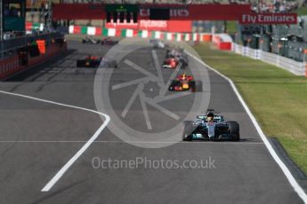 World © Octane Photographic Ltd. Formula 1 - Japanese Grand Prix - Sunday - Race. Lap 2, Lewis Hamilton still leads in his Mercedes AMG Petronas F1 W08 EQ Energy+ ahead of Max Verstappen's Red Bull Racing RB13 as Vettel's Ferrari starts to fall back. Suzuka Circuit, Suzuka, Japan. Sunday 8th October 2017. Digital Ref:1980LB1D0505
