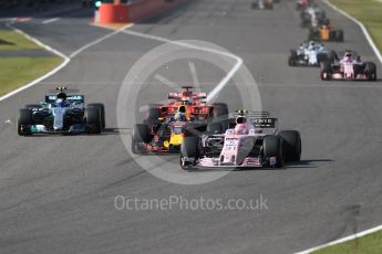 World © Octane Photographic Ltd. Formula 1 - Japanese Grand Prix - Sunday - Race. Lap2, Esteban Ocon - Sahara Force India VJM10, Daniel Ricciardo - Red Bull Racing RB13, Valtteri Bottas - Mercedes AMG Petronas F1 W08 EQ Energy+ and Sebastian Vettel - Scuderia Ferrari SF70H all contest the corner. Suzuka Circuit, Suzuka, Japan. Sunday 8th October 2017. Digital Ref:1980LB1D0540