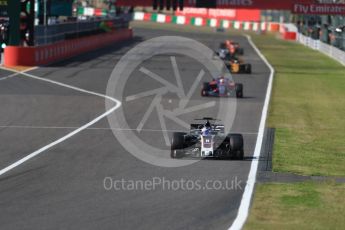 World © Octane Photographic Ltd. Formula 1 - Japanese Grand Prix - Sunday - Race. Romain Grosjean - Haas F1 Team VF-17 and Pierre Gasly - Scuderia Toro Rosso STR12. Suzuka Circuit, Suzuka, Japan. Sunday 8th October 2017. Digital Ref:1980LB1D0718