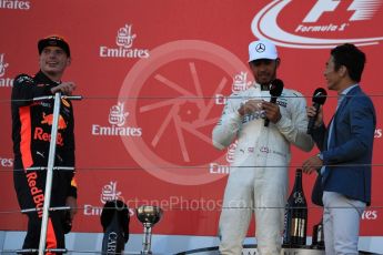 World © Octane Photographic Ltd. Formula 1 - Japanese Grand Prix - Sunday - Podium. Lewis Hamilton - Mercedes AMG Petronas F1 W08 EQ Energy+ and Max Verstappen - Red Bull Racing RB13 with Takuma Sato. Suzuka Circuit, Suzuka, Japan. Sunday 8th October 2017. Digital Ref:1981LB1D1833