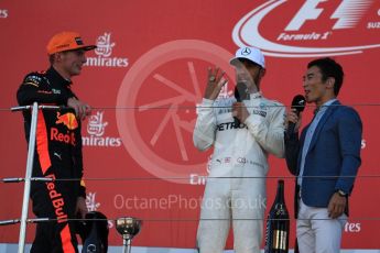 World © Octane Photographic Ltd. Formula 1 - Japanese Grand Prix - Sunday - Podium. Lewis Hamilton - Mercedes AMG Petronas F1 W08 EQ Energy+ and Max Verstappen - Red Bull Racing RB13 with Takuma Sato. Suzuka Circuit, Suzuka, Japan. Sunday 8th October 2017. Digital Ref:1981LB1D1841
