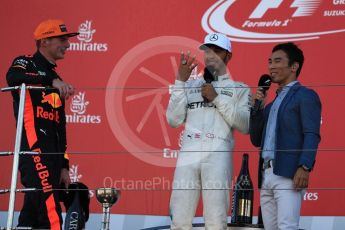 World © Octane Photographic Ltd. Formula 1 - Japanese Grand Prix - Sunday - Podium. Lewis Hamilton - Mercedes AMG Petronas F1 W08 EQ Energy+ and Max Verstappen - Red Bull Racing RB13 with Takuma Sato. Suzuka Circuit, Suzuka, Japan. Sunday 8th October 2017. Digital Ref:1981LB1D1848