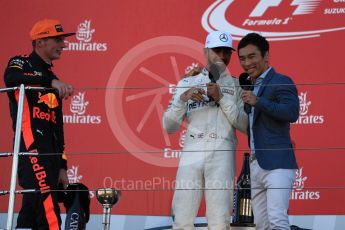World © Octane Photographic Ltd. Formula 1 - Japanese Grand Prix - Sunday - Podium. Lewis Hamilton - Mercedes AMG Petronas F1 W08 EQ Energy+ and Max Verstappen - Red Bull Racing RB13 with Takuma Sato. Suzuka Circuit, Suzuka, Japan. Sunday 8th October 2017. Digital Ref:1981LB1D1862