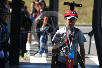 World © Octane Photographic Ltd. Formula 1 - Japanese Grand Prix - Sunday - Paddock.Japanese fan in camera hat. Suzuka Circuit, Suzuka, Japan. Sunday 8th October 2017. Digital Ref:1978LB1D9801